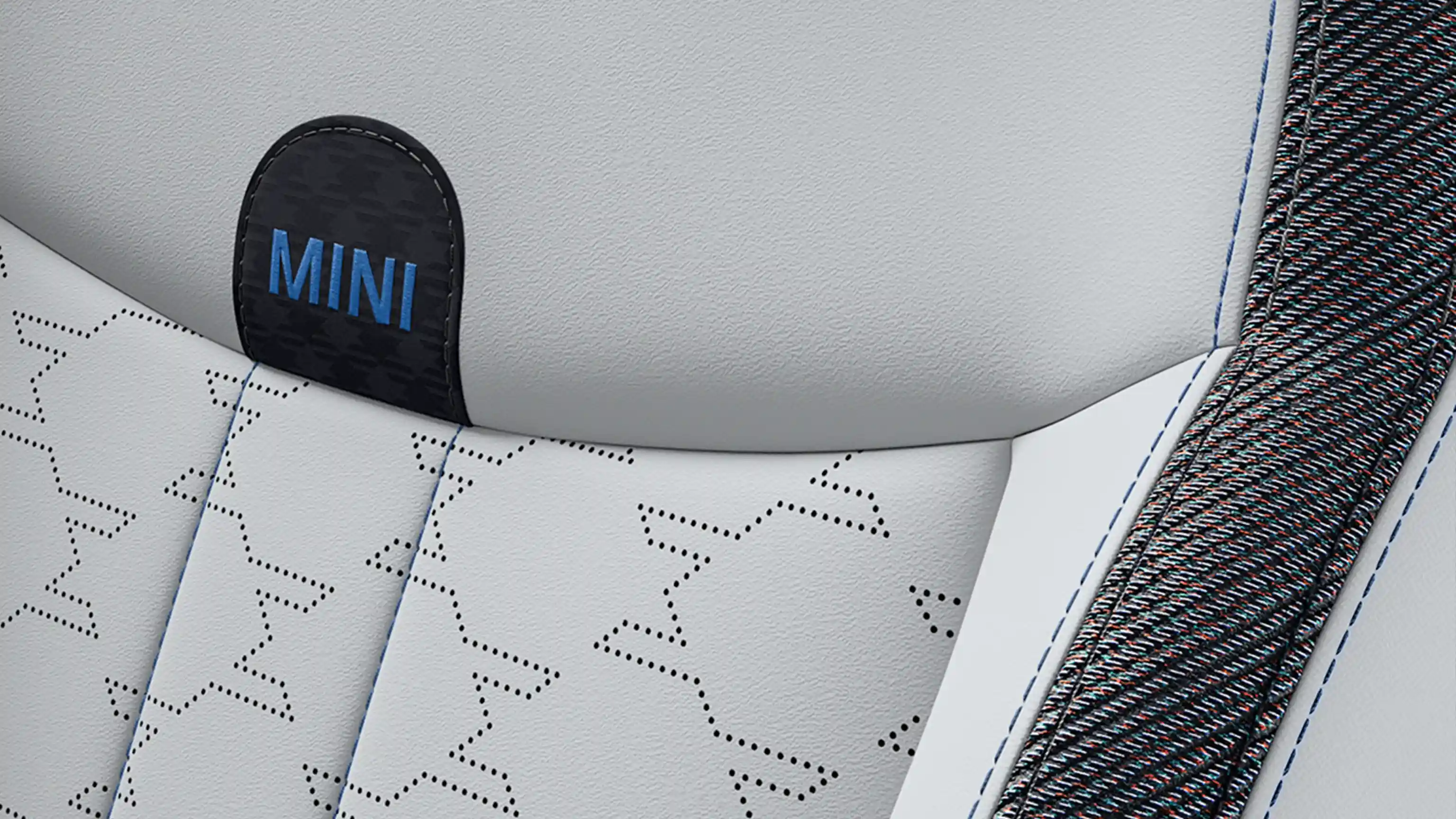 Pogled od znotraj MINI Cooper s 5 vrati z opremo Classic Style s sedeži v sivo-modri kombinaciji Vescin/blago